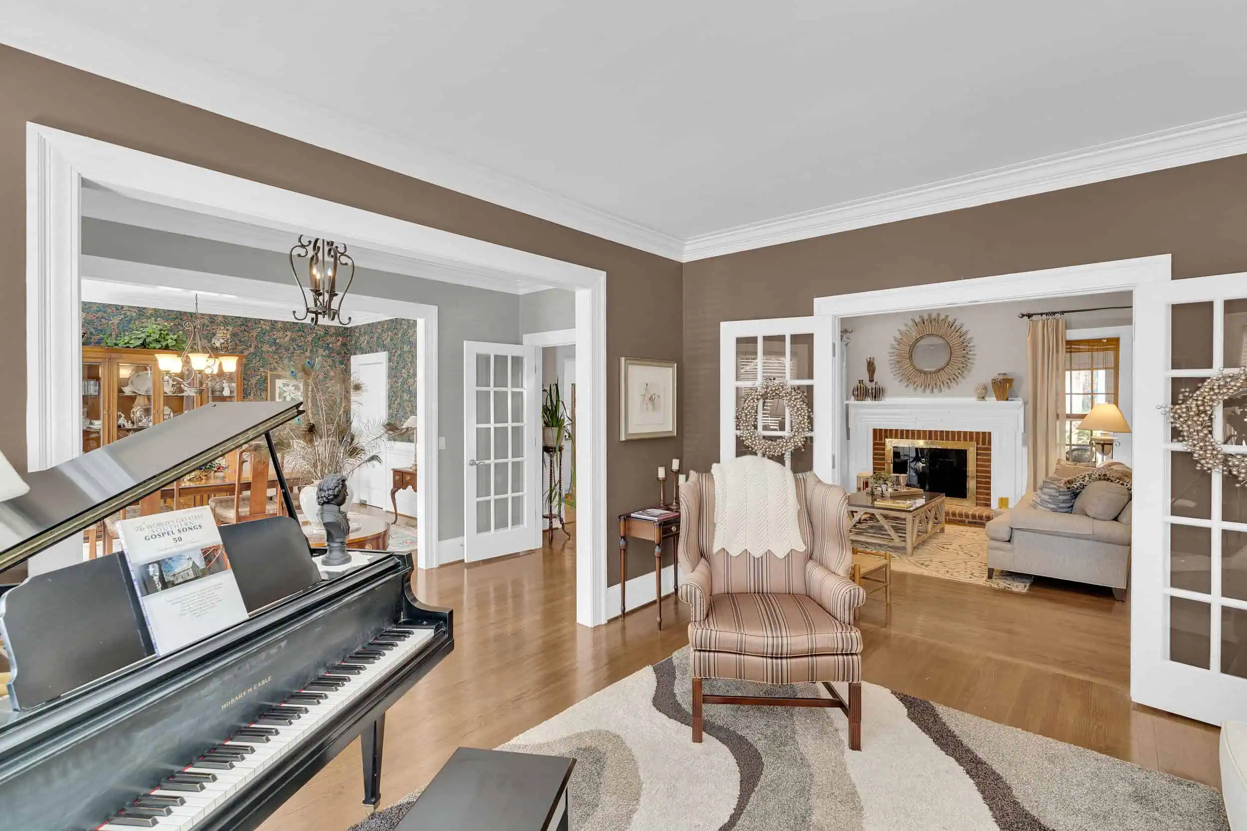 Professionally edited living room with piano