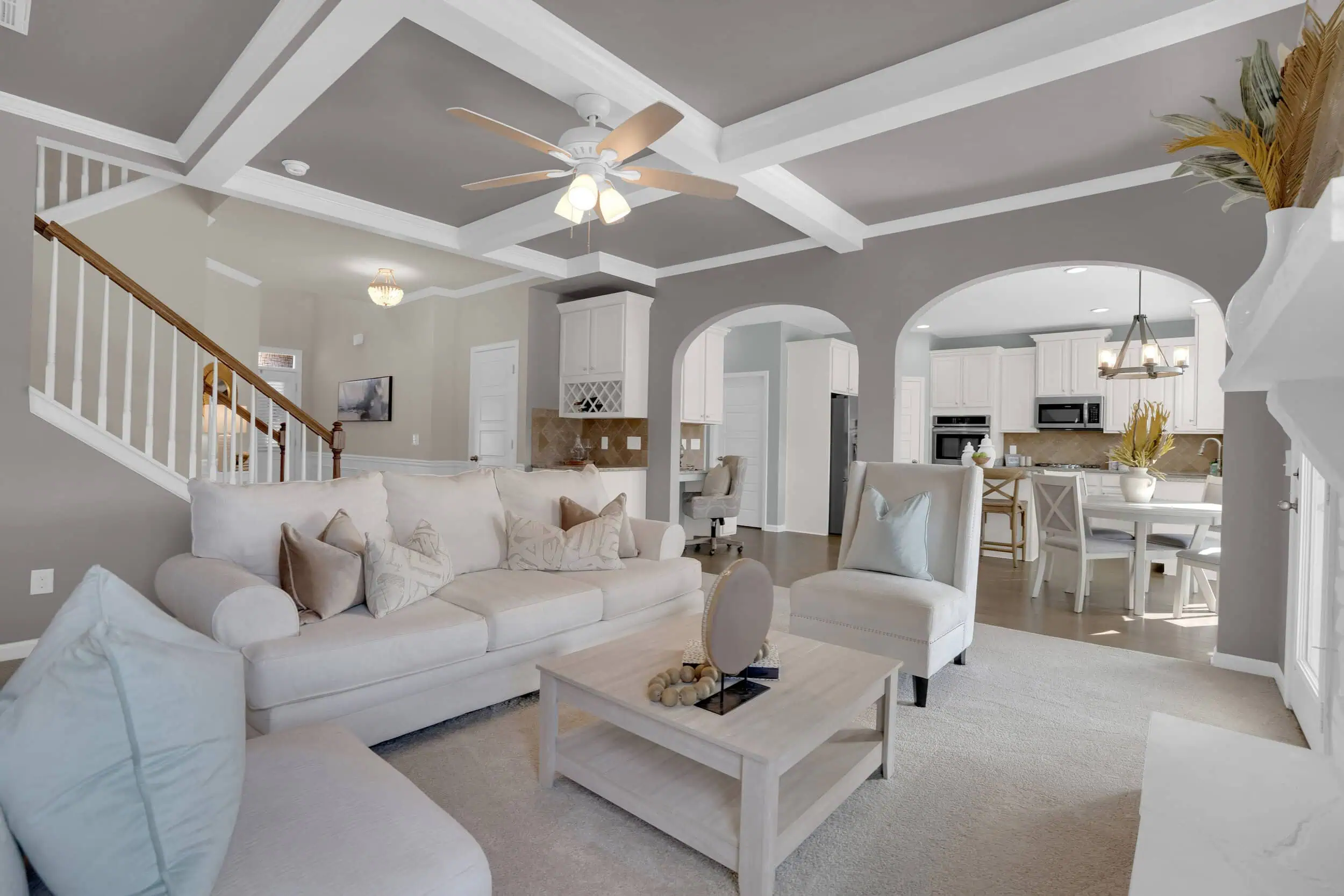 Professionally edited neutral-tone living room photograph