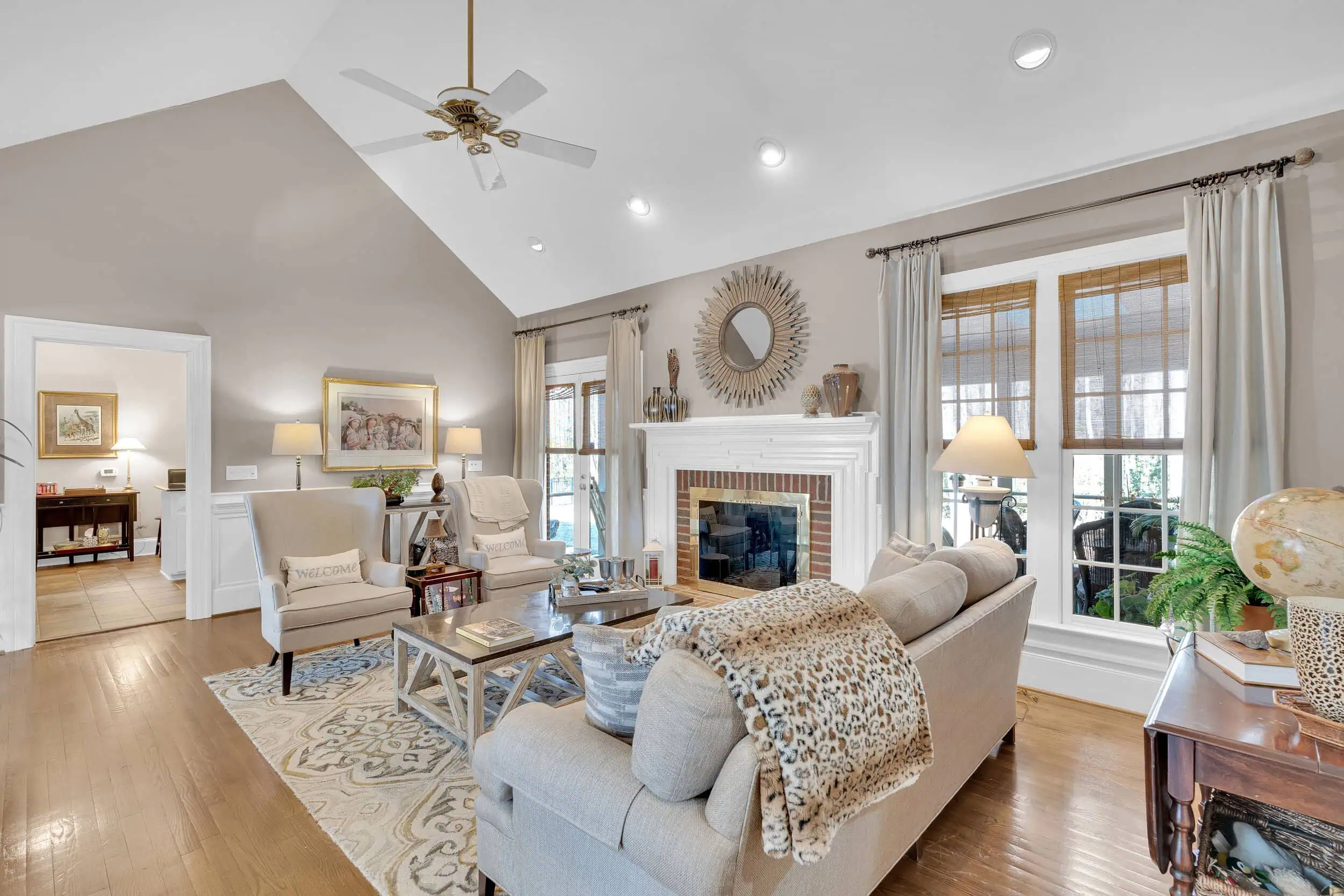 Professionally edited living room with fireplace