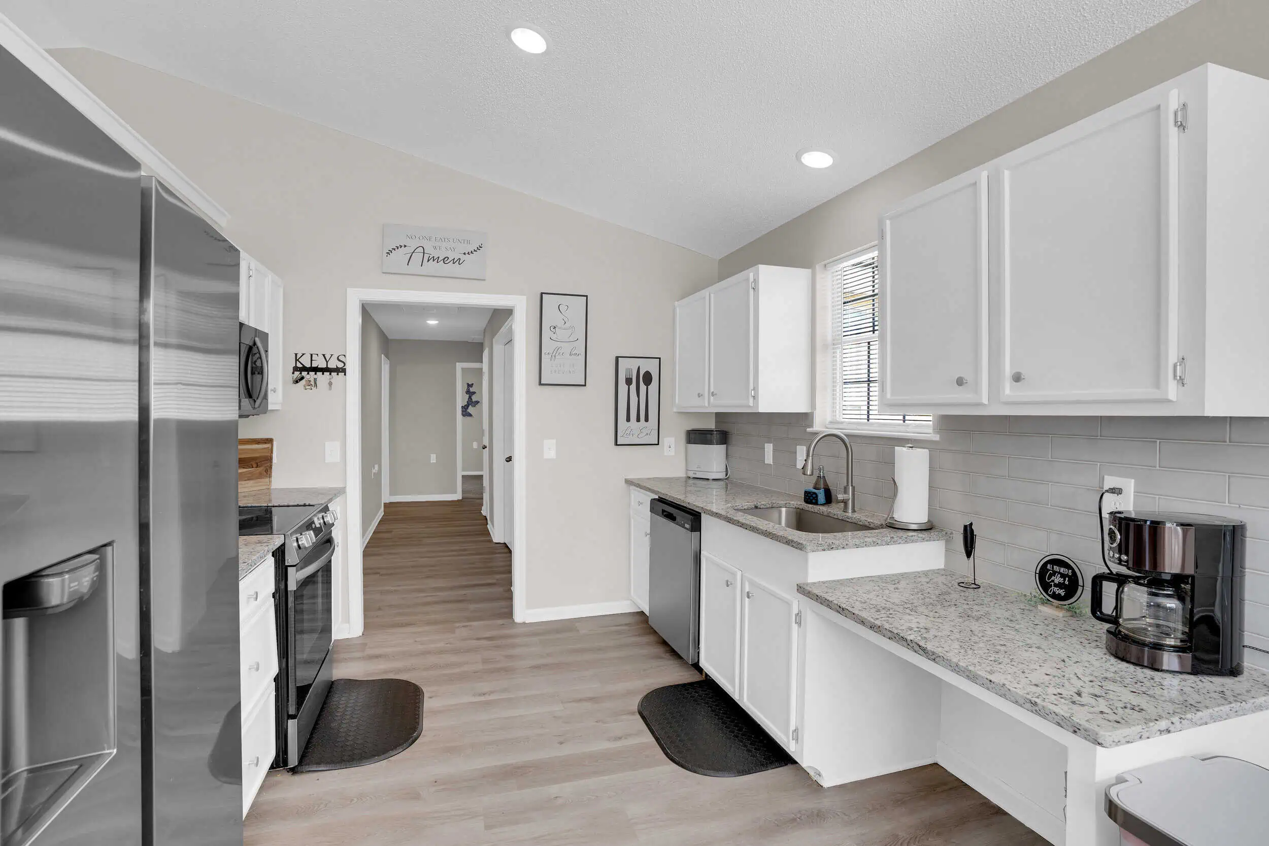 Professionally edited residential galley kitchen photograph