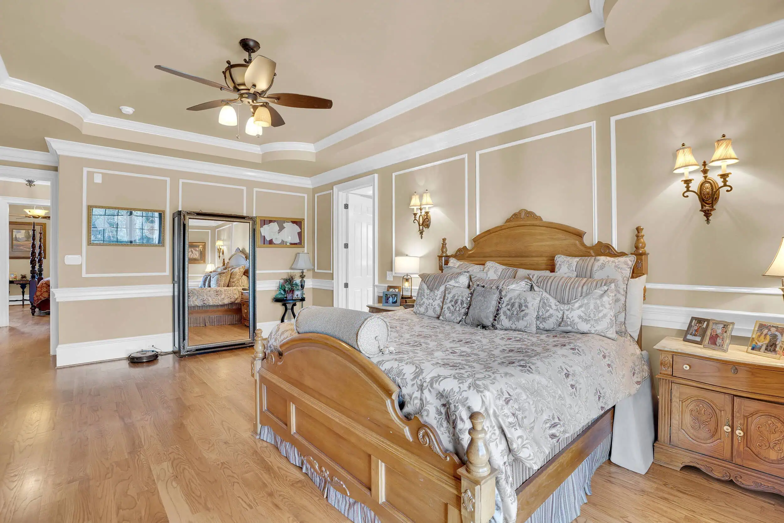 Professionally edited primary bedroom real estate photograph