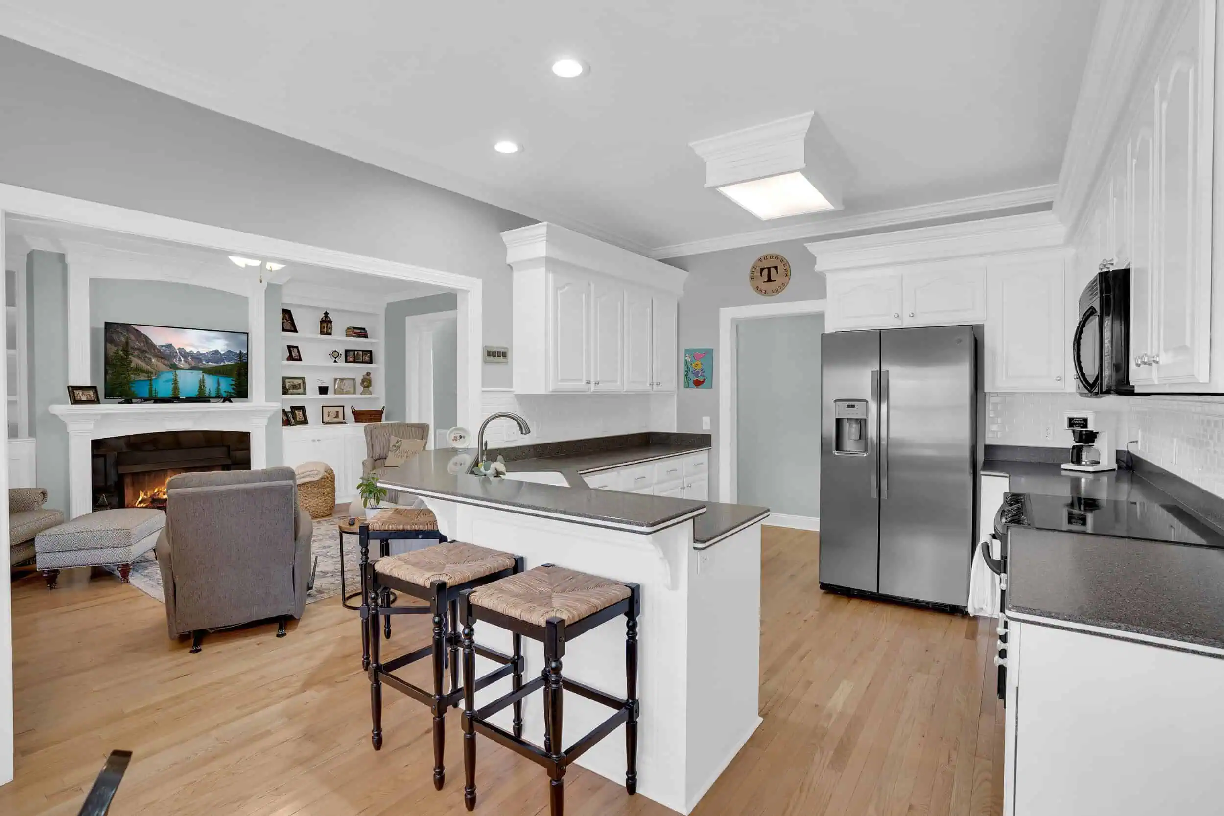 Professionally edited modern white kitchen photograph